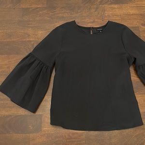 Women’s black trumpet sleeve blouse size M
